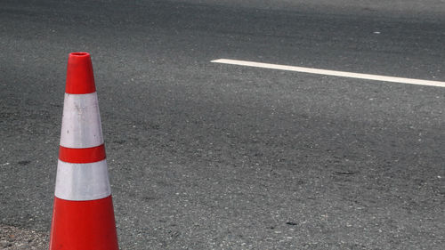High angle view of red umbrella on road