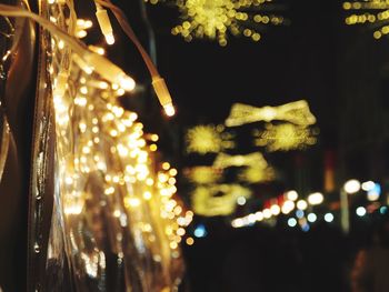 Close-up of illuminated light bulb