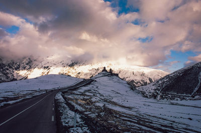 Panoramic view of snowcapped mountain against sky