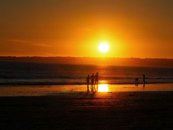 Scenic view of sea at sunset