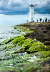 Surface level of lighthouse on beach