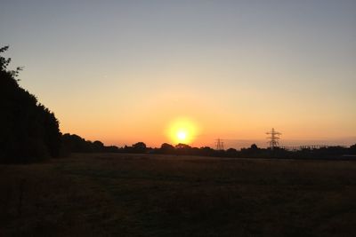 Scenic view of landscape at sunset