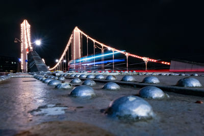 View of bridge in city at night