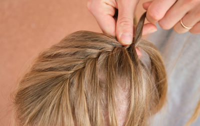 Cropped image of woman with blond hair