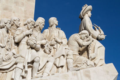 Low angle view of statue against sky