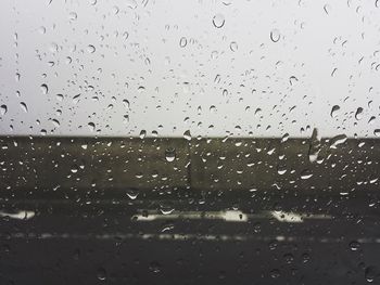 Close-up of water drops on glass