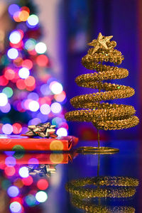 Close-up of illuminated christmas tree at night