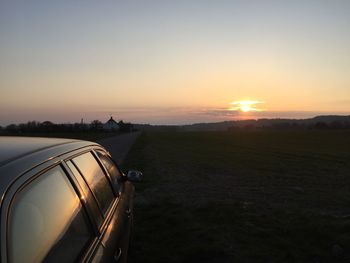 Scenic view of landscape at sunset