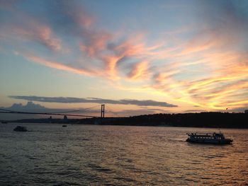 Scenic view of calm sea at sunset