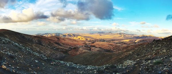 Scenic view of dramatic landscape against sky