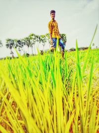 Woman standing on field