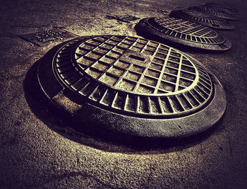 High angle view of manhole on street