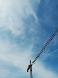 Low angle view of communications tower against sky