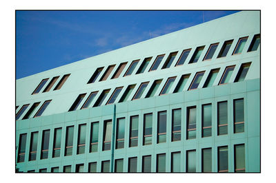 Modern building against blue sky