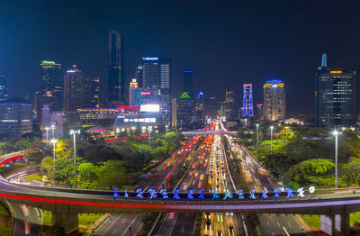 High angle view of illuminated buildings at night