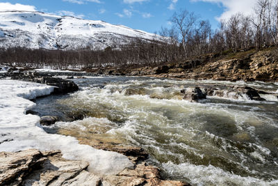 Scenic view of river against sky