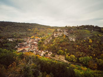 Scenic view of landscape against sky. scenic view of village during autumn 