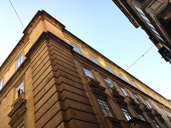 Low angle view of buildings against clear sky