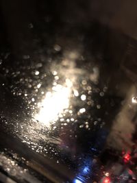 Close-up of raindrops on glass window