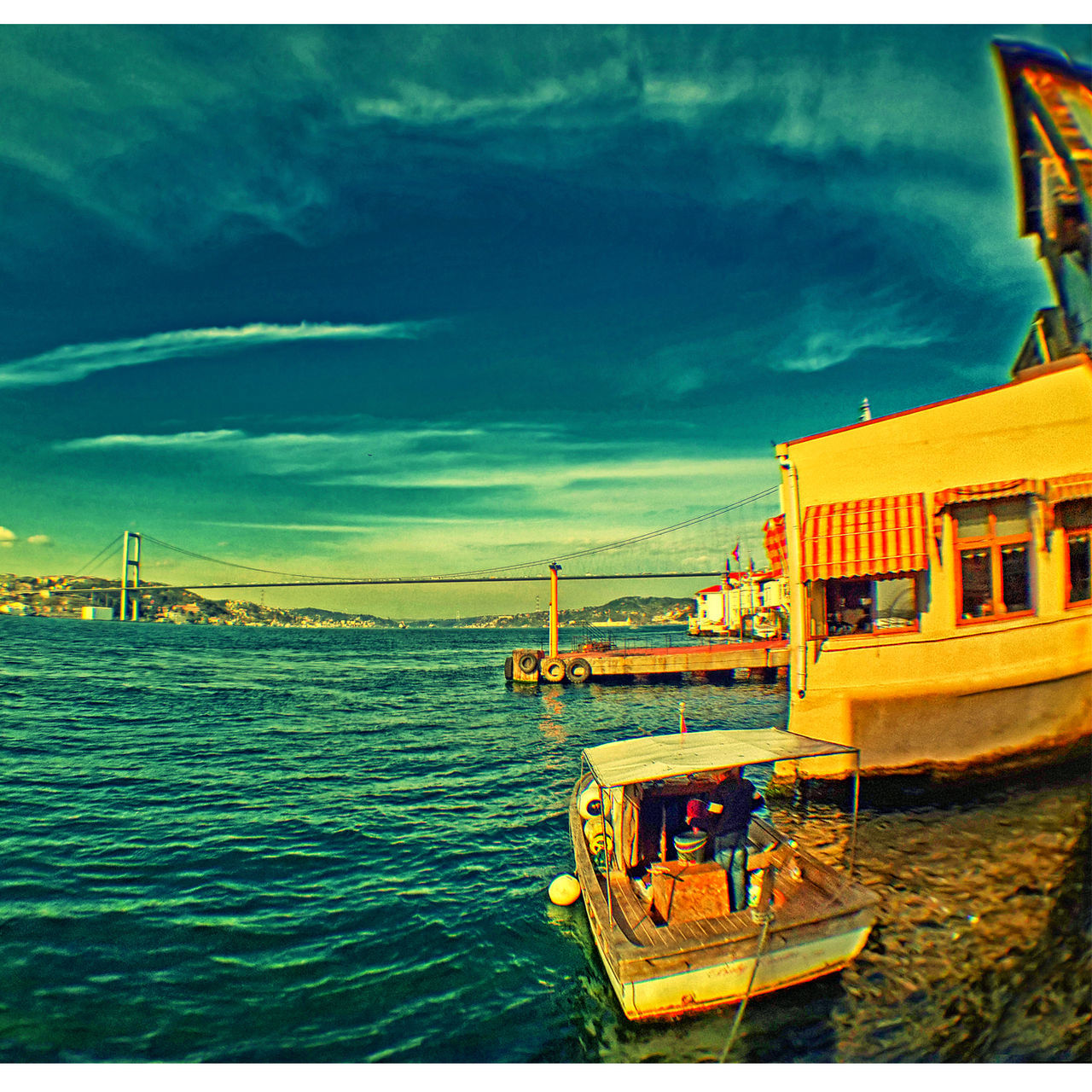 water, nautical vessel, sky, sea, transportation, boat, cloud - sky, mode of transport, moored, built structure, waterfront, architecture, cloud, building exterior, blue, cloudy, nature, pier, outdoors, scenics