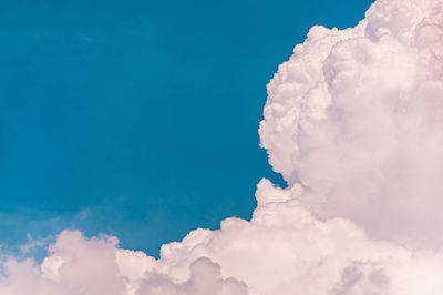 Low angle view of cloudscape against blue sky