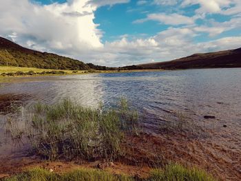 Scenic view of lake against sky