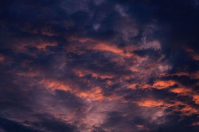 Low angle view of dramatic sky during sunset