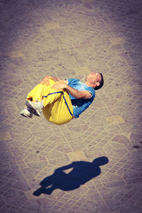 High angle view of man lying down