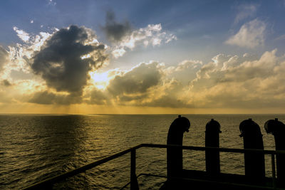 Silhouette of stack of exhausts on a construction work barge at offshore terengganu oil field