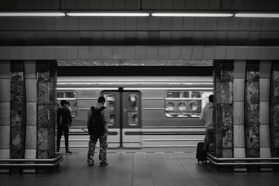 People at railroad station