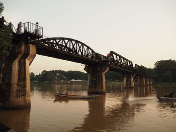 Bridge over river against clear sky