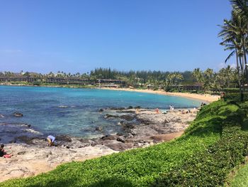 Scenic view of sea against clear blue sky