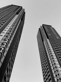 Low angle view of modern buildings against clear sky