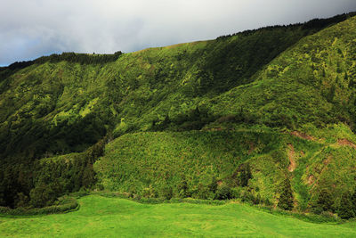 Scenic view of green mountains at azores