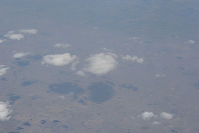 High angle view of puddle against sky