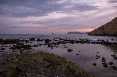 Scenic view of sea against sky at sunset