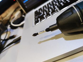 High angle view of mobile phone on table