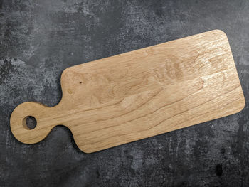 High angle view of cutting board on table