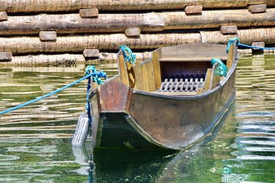 Boat moored in lake