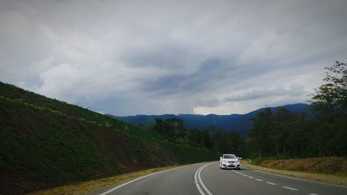 Road passing through mountain road
