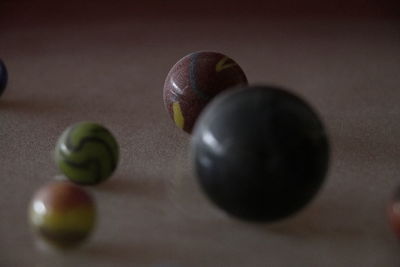 High angle view of fruits and balls on table