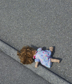 High angle view of doll on street