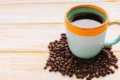 Close-up of coffee cup on table