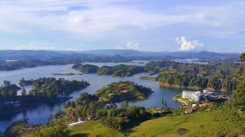 High angle view of lake against cloudy sky