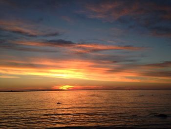 View of calm sea at sunset