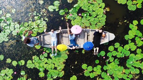 High angle view of people floating on water