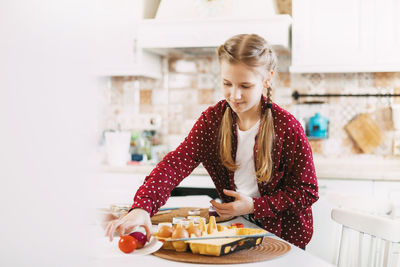 Woman preparing food at home