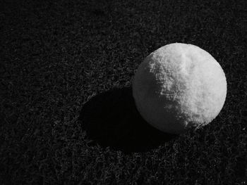 High angle view of ball on field at night