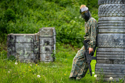 Rear view of man standing on field