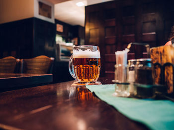 Close-up of beer on table